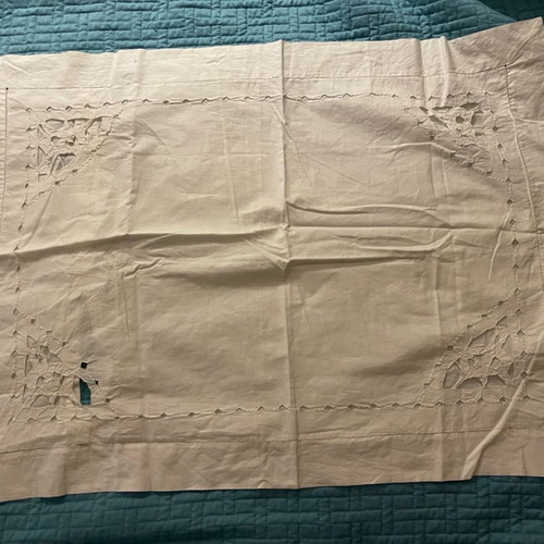 Pillowcase with cutwork embroidery used, button closure