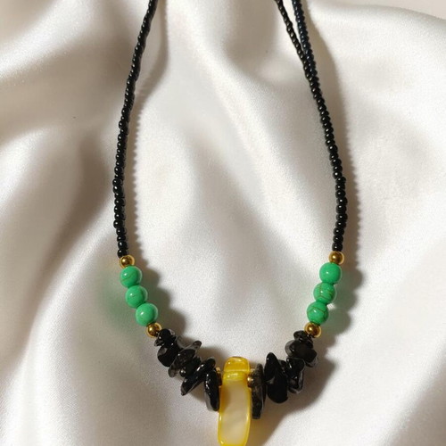 Obsidian Sun necklace new with black, green and yellow details