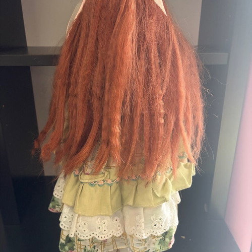 Porcelain doll like new with ginger hair