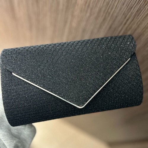 Black clutch handbag like new with embossed texture