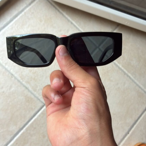 Prada sunglasses in excellent condition, black