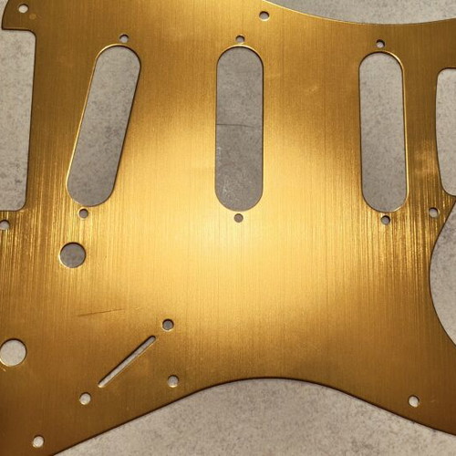 Gold metal Strat pickguard