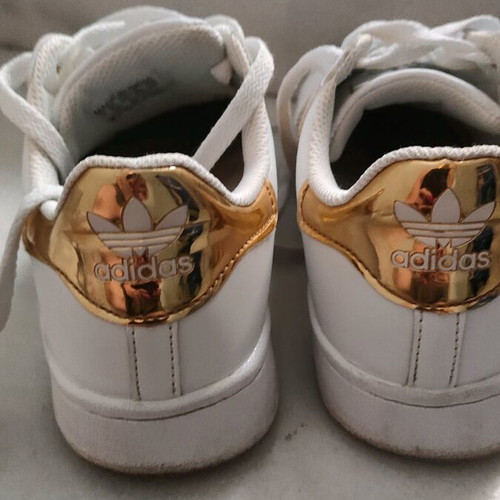 Athletic shoes used size 39 with gold details