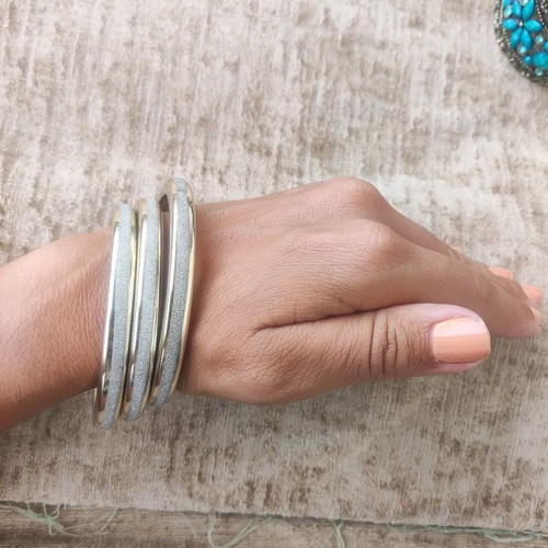 Bracelet set used, 3 round gold plastic with silver glitter