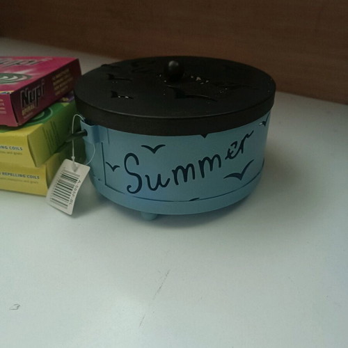 Insect repellent container like new, pack with coils