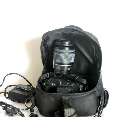 Pentax K10 DSLR camera used with lenses and case