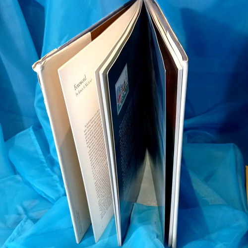 Golden Moments 1984 Olympics book used, USPS edition, Robert Peak art