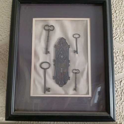 Collection of old keys new in frames for wall decoration