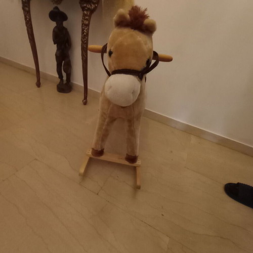 Plush brown rocking horse like new
