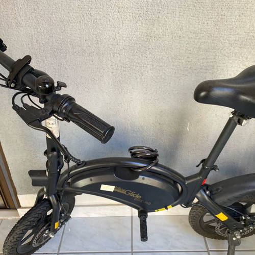 Electric folding city bike like new, 350W motor, 14-inch wheels