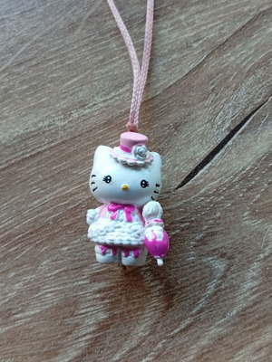 Hello Kitty figure used with wear