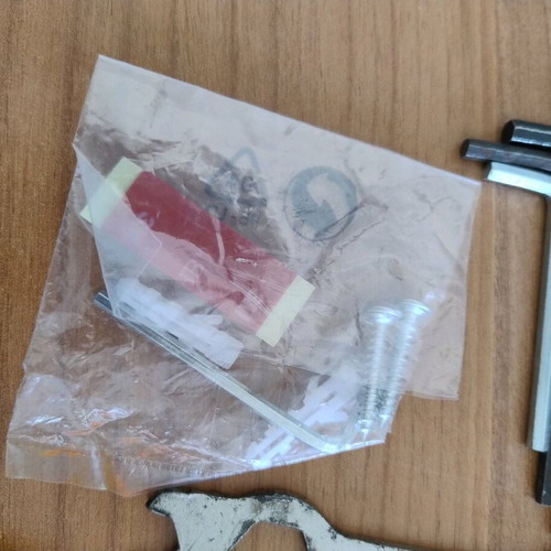 Various tools set used with 2 screwdrivers, 4 allen keys, screws and nails