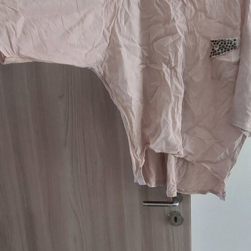 Baby pink blouse used with 3/4 sleeve asymmetric and studs size M