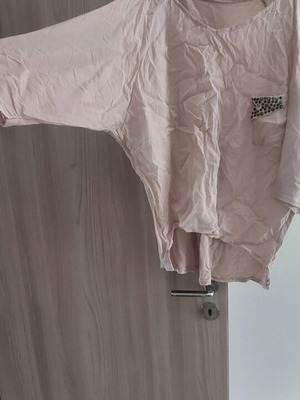 Baby pink blouse used with 3/4 sleeve asymmetric and studs size M