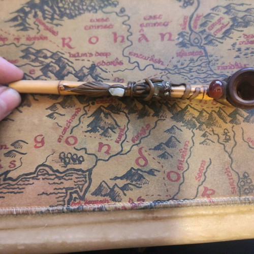 Handmade wooden pipe used with stone and owl decoration