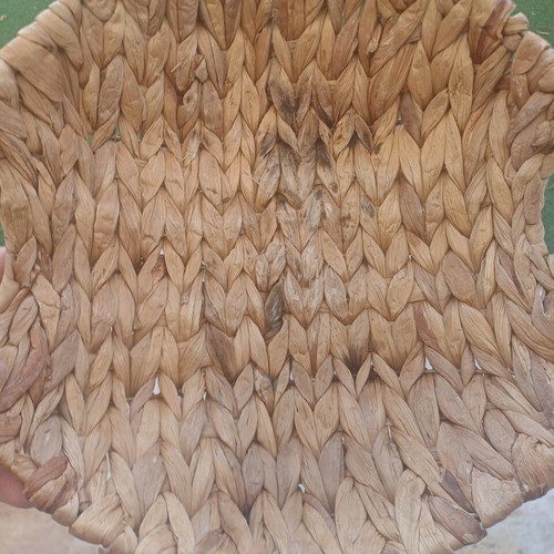 Wicker basket with black handles used