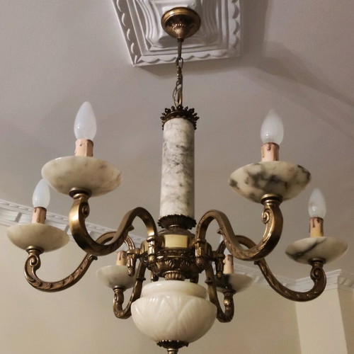 Vintage chandelier used, made of bronze and natural stone