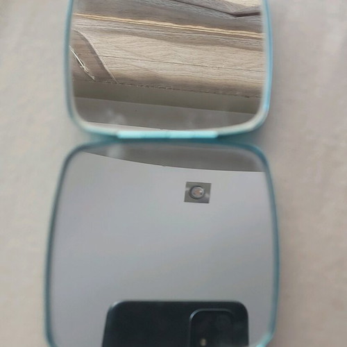 Square bag mirror like new, blue with star decoration