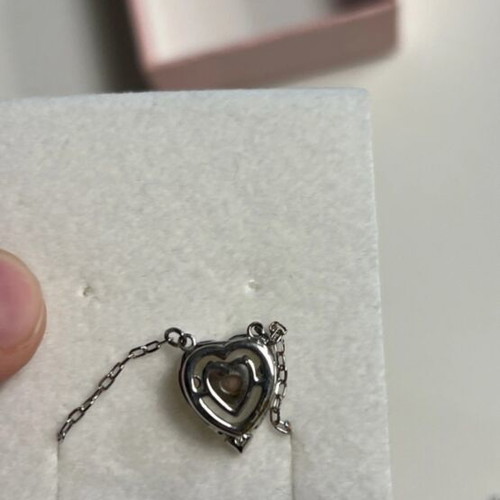 Swarovski 3D heart necklace used, gray and pink