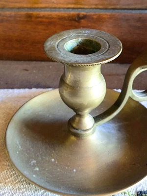 Vintage brass candlestick with handle used