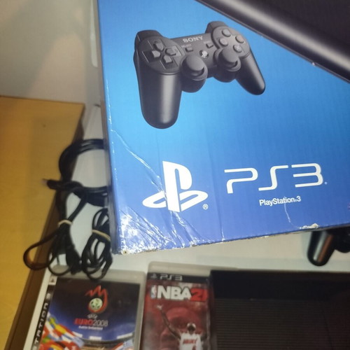 PS3 Super Slim 12GB console with 4 games and 3 controllers