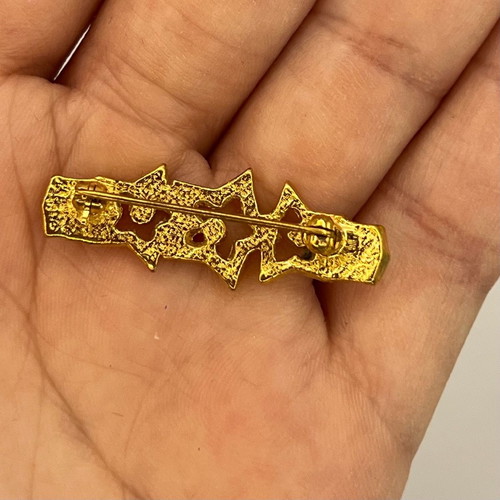 Small pin used with three stars and rhinestones gold plated