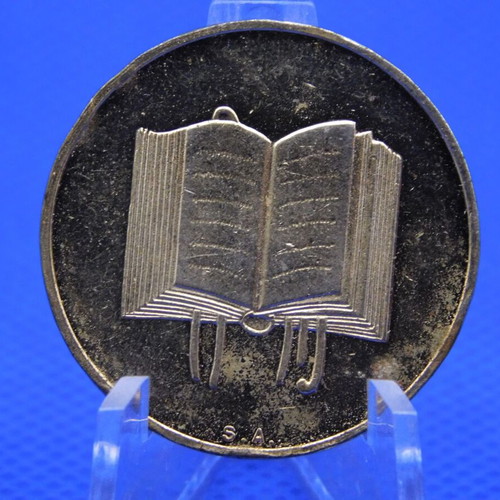 Commemorative metal token with Prince Rainier and Grace Kelly of Monaco