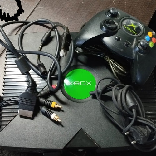 Original Microsoft Xbox console with controller and cables