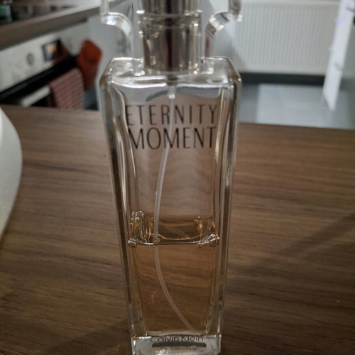 Calvin Klein Eternity Moment perfume used, visible level
