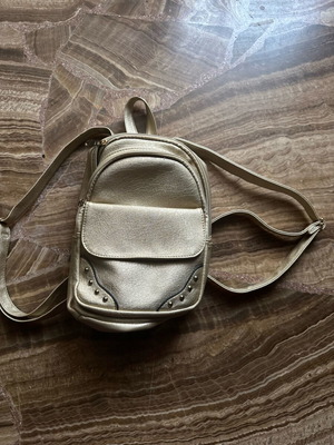 Backpack like new, gold color