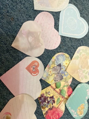 Small heart-shaped paper notes like new
