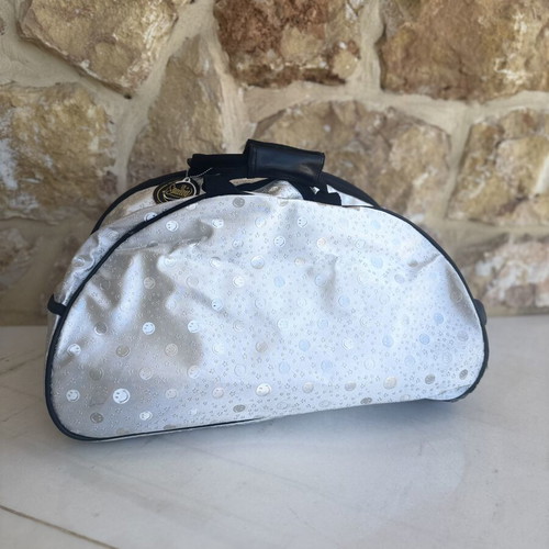 Smiley metallic travel bag used with embossed smiley and star designs