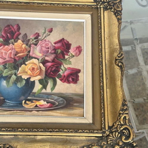 Vintage oil painting on canvas with roses in embossed gold wooden frame, used