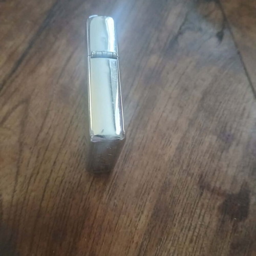 Zippo windproof lighter used with silver metal finish