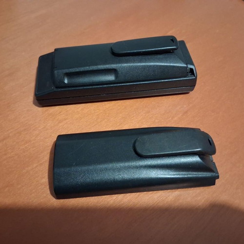 Ericsson charging base and two used batteries Type 4225 and 3009/3008