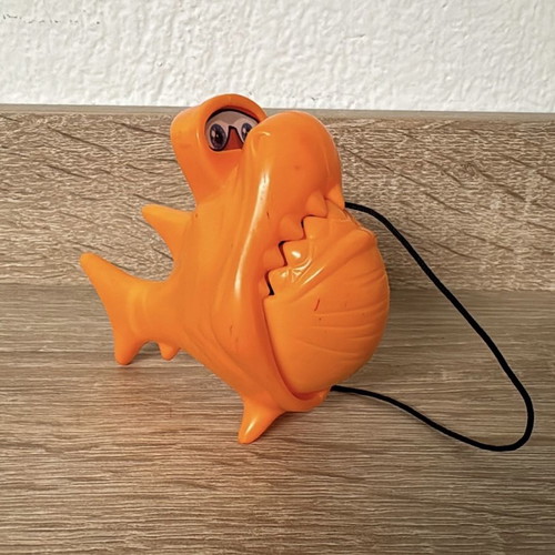 Chupa Chups Piranha toys used, orange with green fish