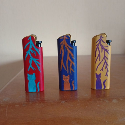 Hand-painted lighters with cat design, set of 3
