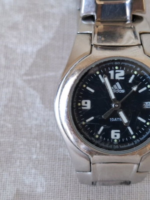 Ρολόι quartz γυναικείο adidas, STAINLESS STEEL, 10ATM, JAPAN MOVEMENT, με ημερομηνία.