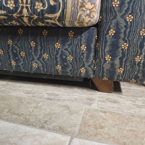 Two-seater sofa with storage compartment