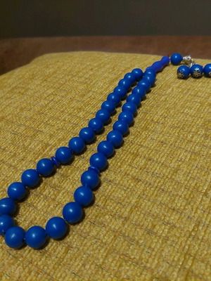 Blue rosary with silver chain like new