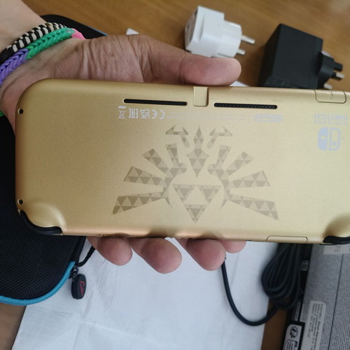 Nintendo Switch Lite Hyrule Edition with protective case