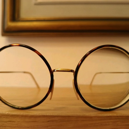 Eyeglasses used, very lightweight, gold color