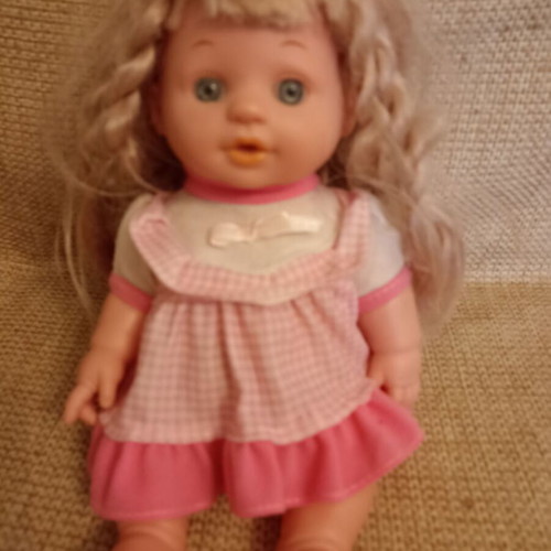 Doll with long hair like new