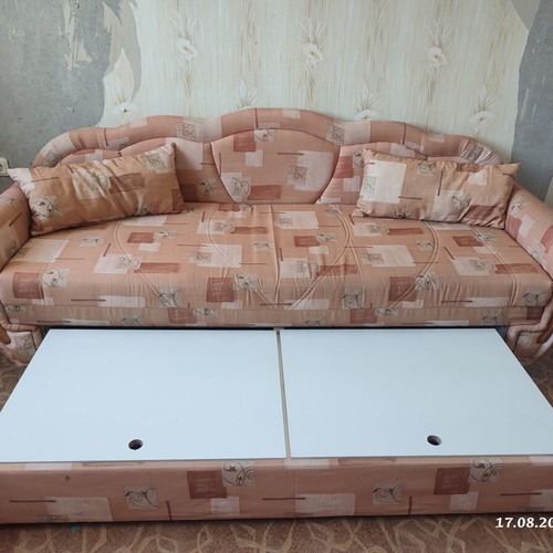 Practical extendable sofa bed with two storage compartments