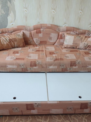 Practical extendable sofa bed with two storage compartments