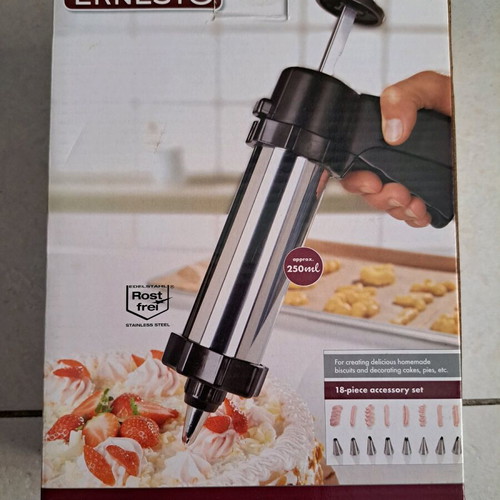 Biscuit press cornet metal like new, 18 pieces