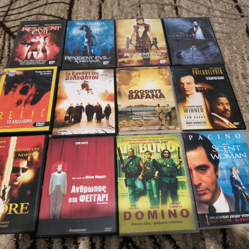 Collection of 60 used DVDs with classic and adventure movies