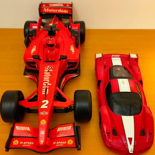 Formula and Ferrari toy cars used, set of 2, battery operated