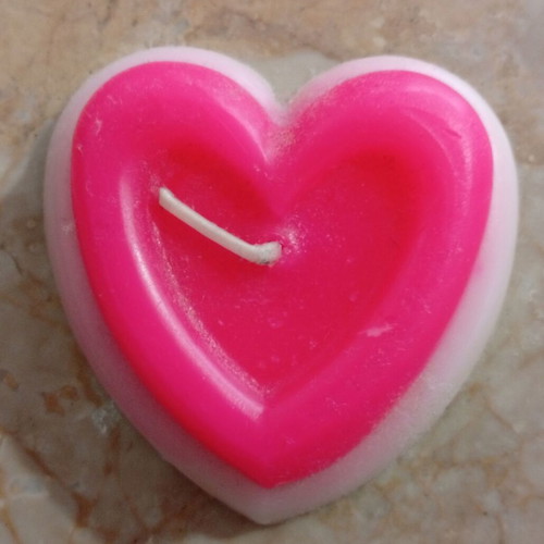 Handmade heart-shaped candle