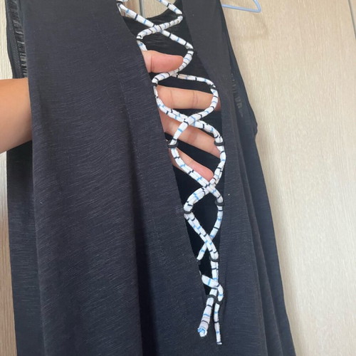 Small cotton salopette used with pockets